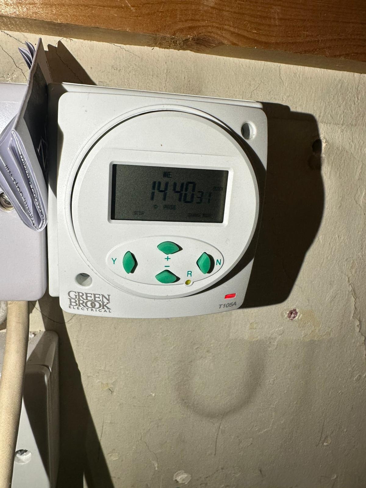 Time switch being checked during an electrical inspection
